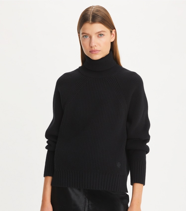 Tory Sport designer sweaters Wool Turtleneck Sweater in Black on model detail