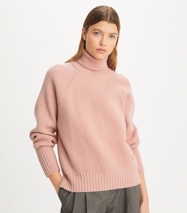 Tory Sport designer sweaters Wool Turtleneck Sweater in Dusk Pink on model detail