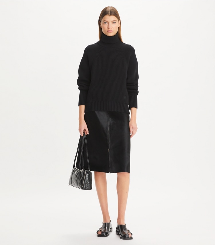 Tory Sport designer sweaters Wool Turtleneck Sweater in Black on model front