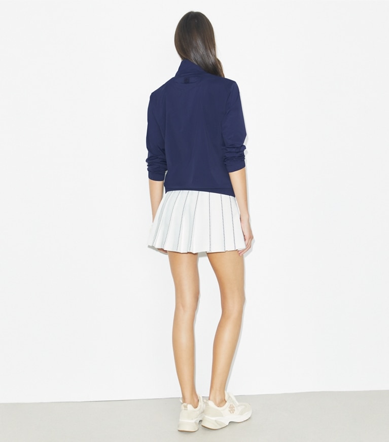 Tory Burch designer bottoms X-Embroidered Pleated Tennis Skirt in Snow White front