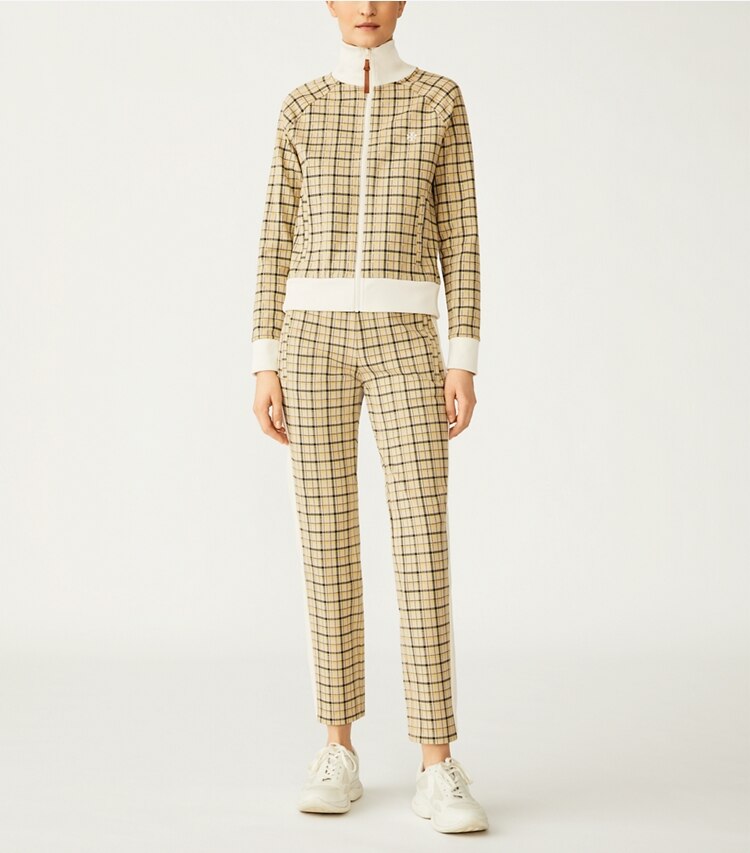 Tory Sport designer bottoms Yarn-Dyed Double Knit Track Pants in Beige Groove Plaid on model front