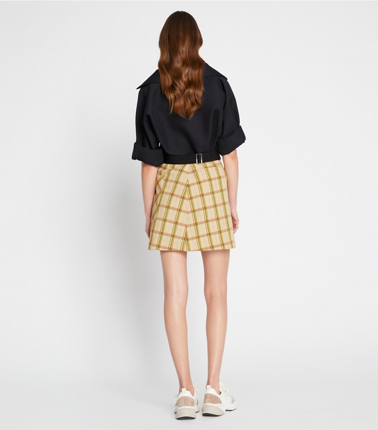 Tory Sport designer bottoms Yarn-Dyed Twill Club Skirt in Beige Party Plaid on model back