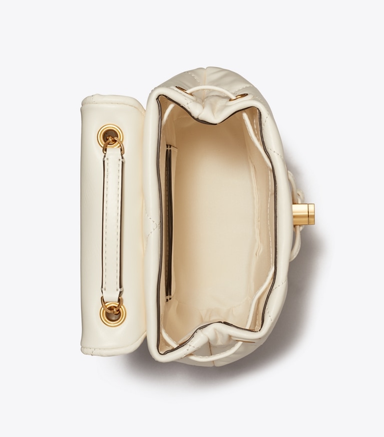 Tory Burch designer zaino Zaino mini Kira con trapuntatura a diamante in Warm White angle