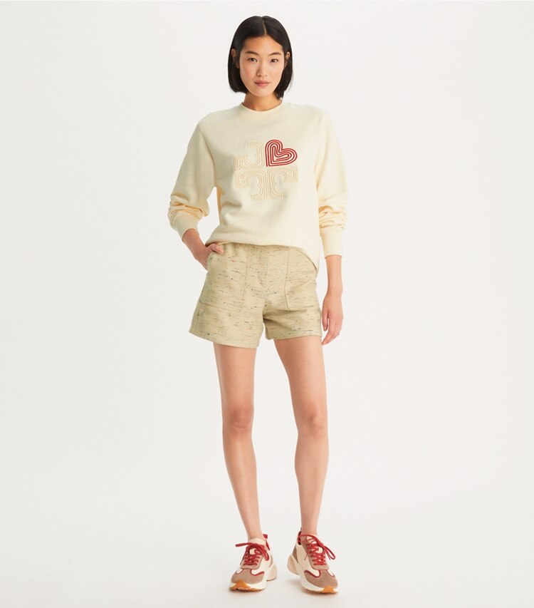 Tory Burch diseñador zapatillas Zapatilla deportiva Good Luck en New Cream / Taupe / TORY RED accesorio en modelo