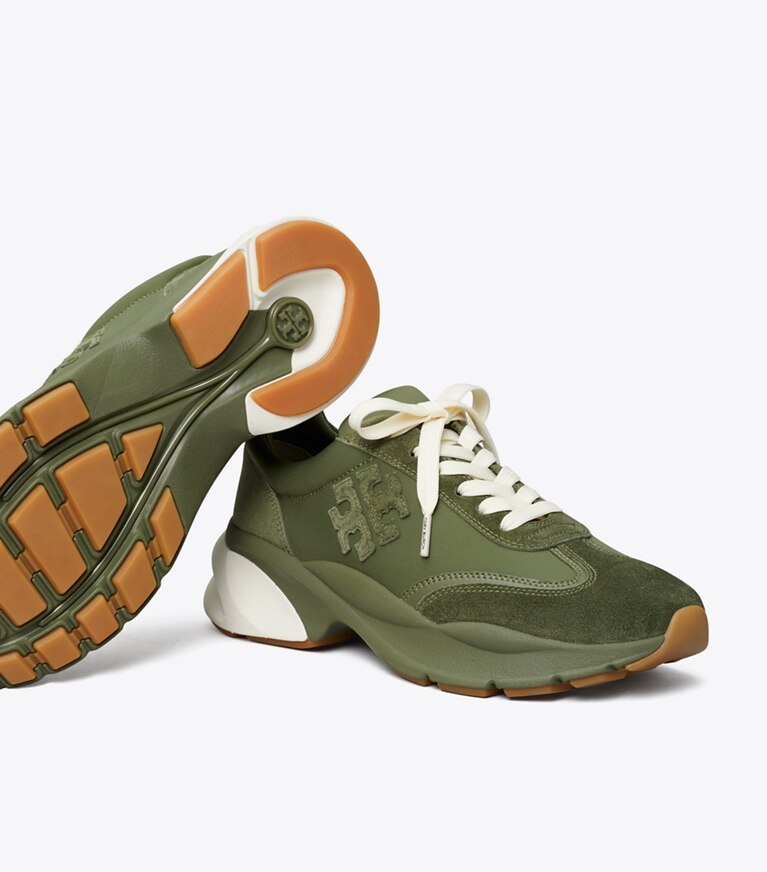 Tory Burch diseñador zapatillas Zapatilla deportiva Good Luck en Palm Leaf reversible plegable