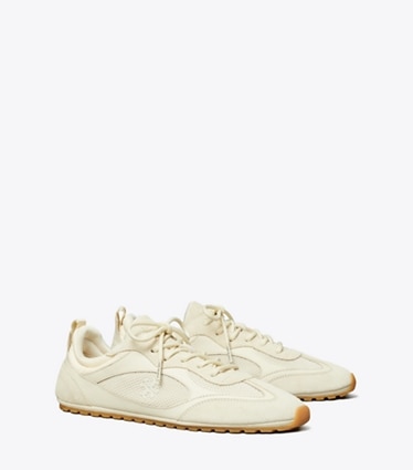 Tory Burch diseñador zapatillas Zapatilla Field en LIGHT CREAM ángulo