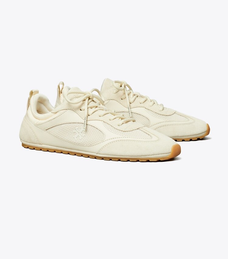 Tory Burch diseñador zapatillas Zapatilla Field en LIGHT CREAM ángulo