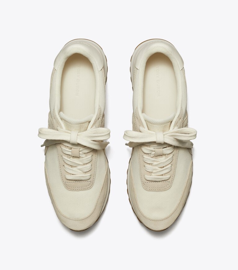Tory Burch diseñador zapatillas Zapatilla Hank en NEW IVORY / CALCARE / TITANIUM WHITE vista superior