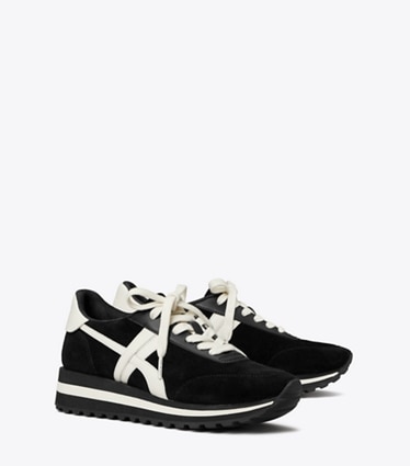 Tory Burch diseñador zapatillas Zapatillas con cuña Hank en BLACK/NEW IVORY/TITANIUM WHITE ángulo