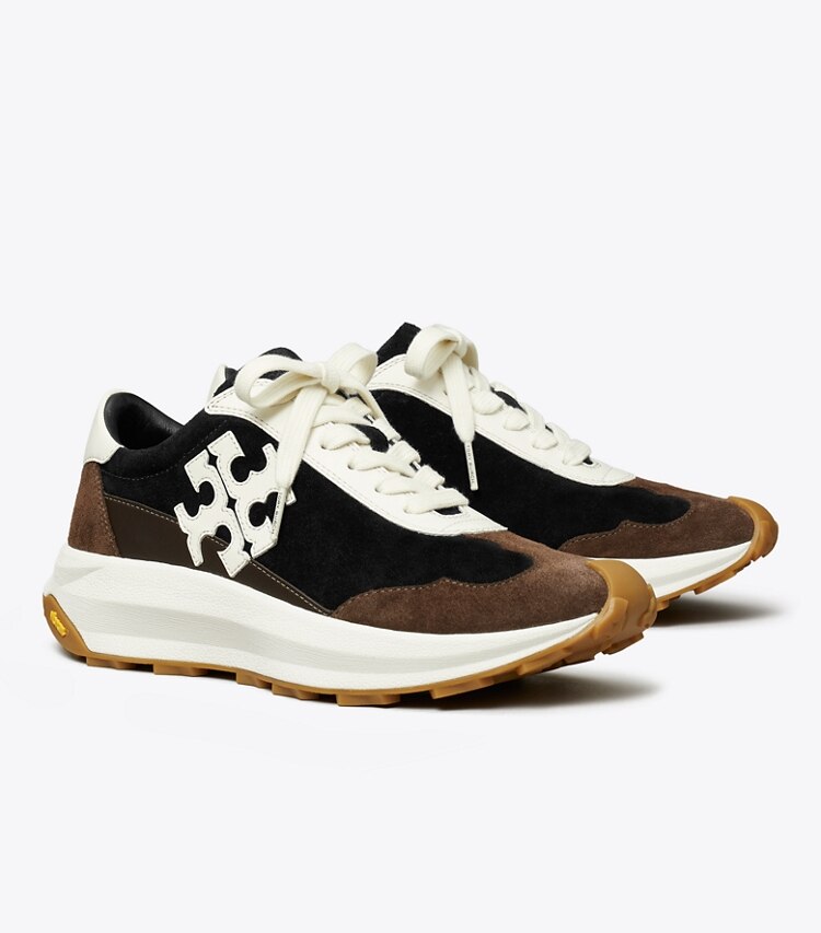 Tory Burch diseñador zapatillas Zapatillas Tory Trainer en PERFECT BLACK / CREAM / DARK COCOA ángulo