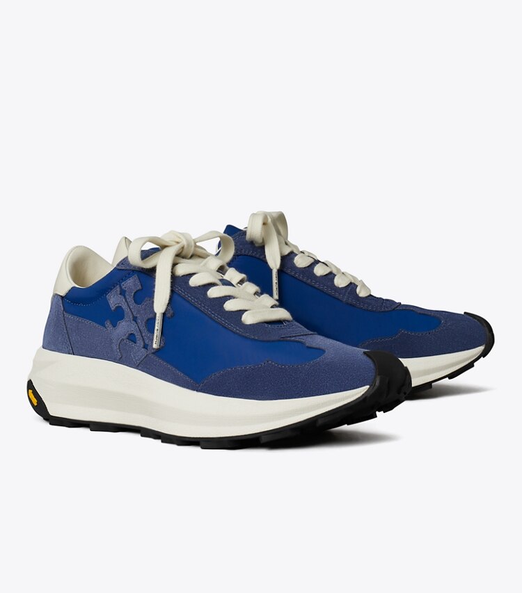 Tory Burch diseñador zapatillas Zapatillas Tory Trainer en AZURE / FADED NAVY / CREAM ángulo