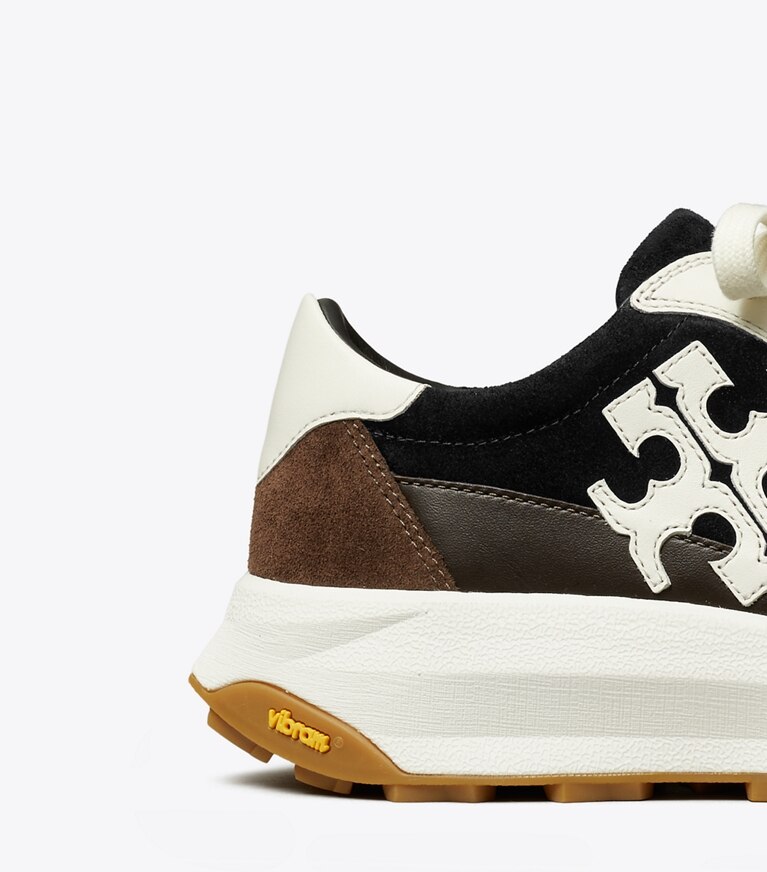 Tory Burch diseñador zapatillas Zapatillas Tory Trainer en PERFECT BLACK / CREAM / DARK COCOA detalle
