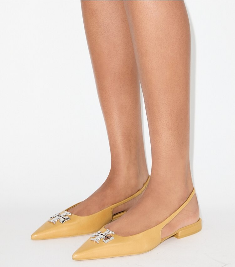 Tory Burch diseñador zapatos planos Zapato con tira trasera Eleanor plano en HONEYCOMB TAN accesorio en modelo