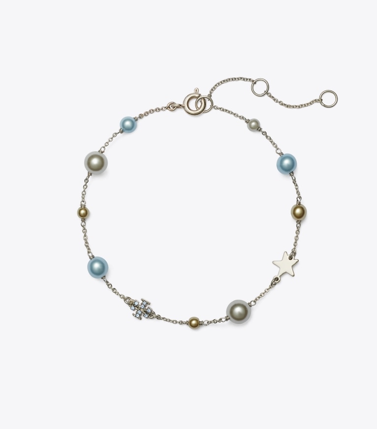 Tory Burch designer armbänder Zartes Moondance Armband mit Perlen und Sternen in Tory Silver / Light Sapphire / Pearl front