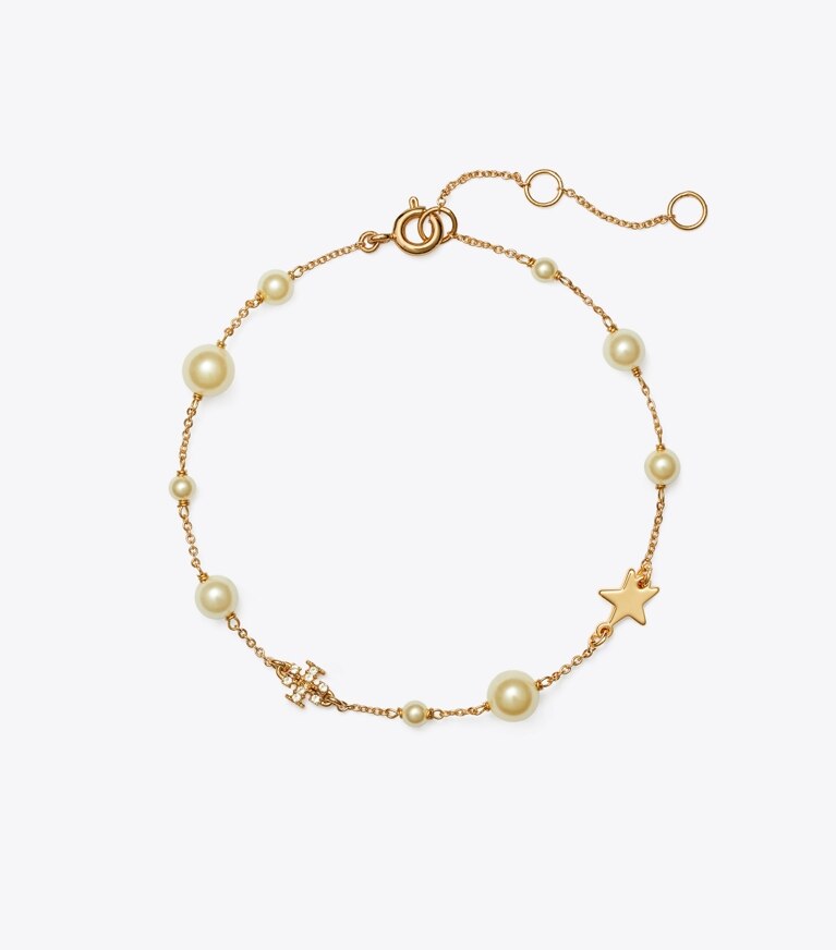 Tory Burch designer armbänder Zartes Moondance Armband mit Perlen und Sternen in Tory Gold / Crystal / Pearl front