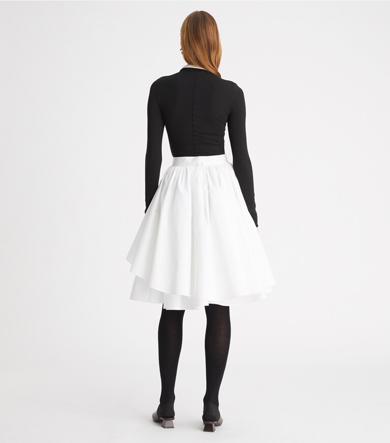 Tory Burch designer tops Zip Front Long-Sleeve Jersey Top in Black on model back