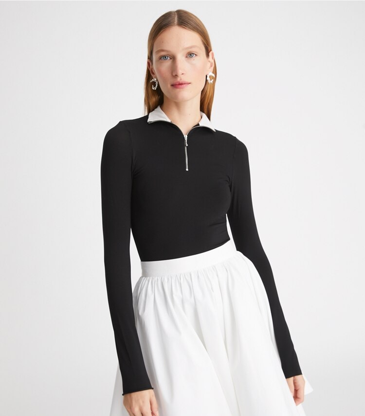Tory Burch designer tops Zip Front Long-Sleeve Jersey Top in Black on model detail