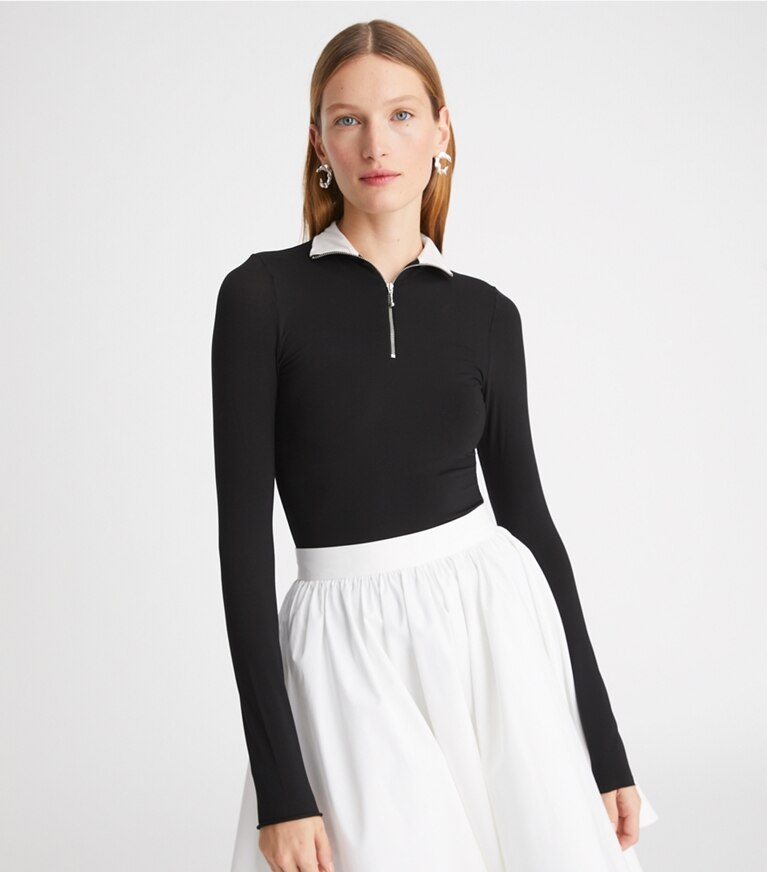 Tory Burch designer tops Zip Front Long-Sleeve Jersey Top in Black on model detail