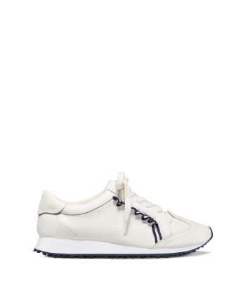 tory burch golf ruffle trainers