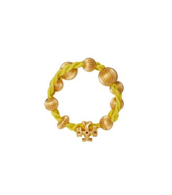 Tory Burch Roxanne Wrap Bracelet In Rolled Brass / Yellow