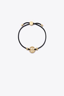 Shop Tory Burch Miller Slider Bracelet In Tory Gold/black