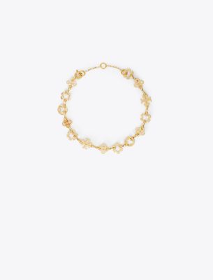 Shop Tory Burch Kira Clover Multi Motif Bracelet In Tory Gold