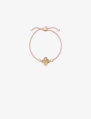 Shop Tory Burch Kira Clover Slider Bracelet In Tory Gold/pink