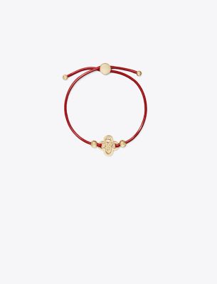 Shop Tory Burch Kira Clover Slider Bracelet In Tory Gold/matchstick Red