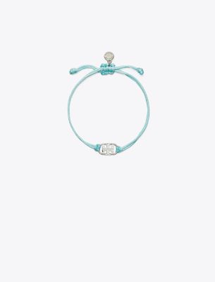 Shop Tory Burch Embrace Ambition Logo Bracelet In Tory Silver/light Blue