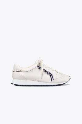 tory burch golf ruffle trainers