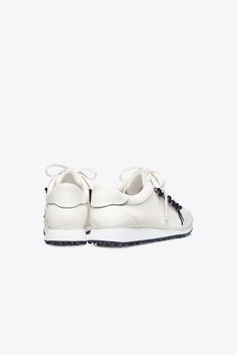 tory burch golf ruffle trainers