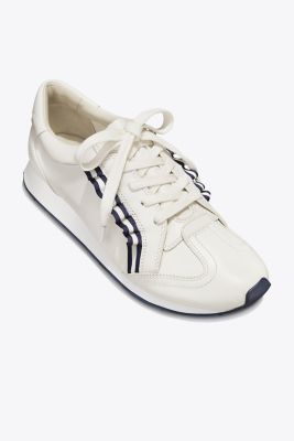 tory burch golf ruffle trainers