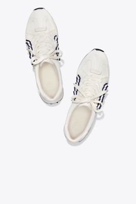 tory burch golf ruffle trainers